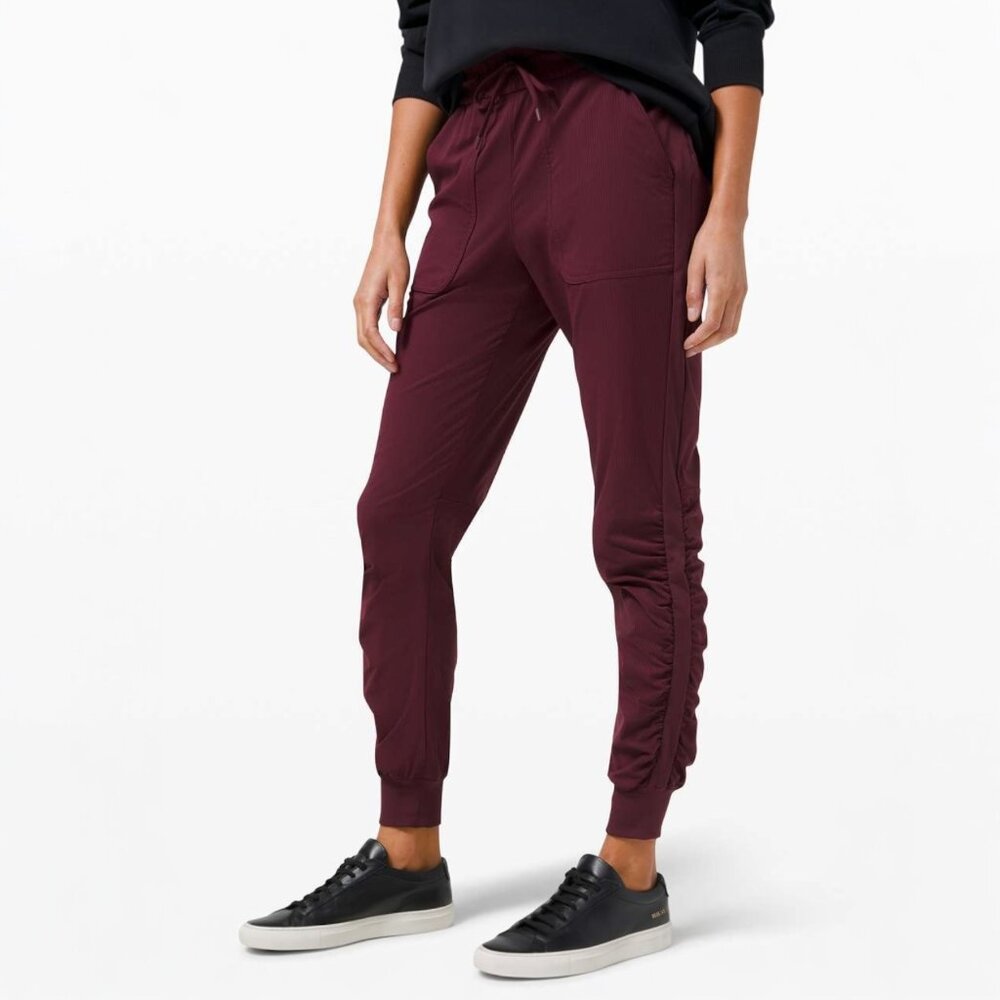 LULULEMON BEYOND THE STUDIO JOGGERS IN CASSIS SIZE 4